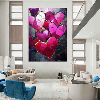 Contemporary abstract artwork features vibrant pink and red hearts with gold foil accents against a dark background illuminated by a mosaic of broken glass pieces. DLZ1721