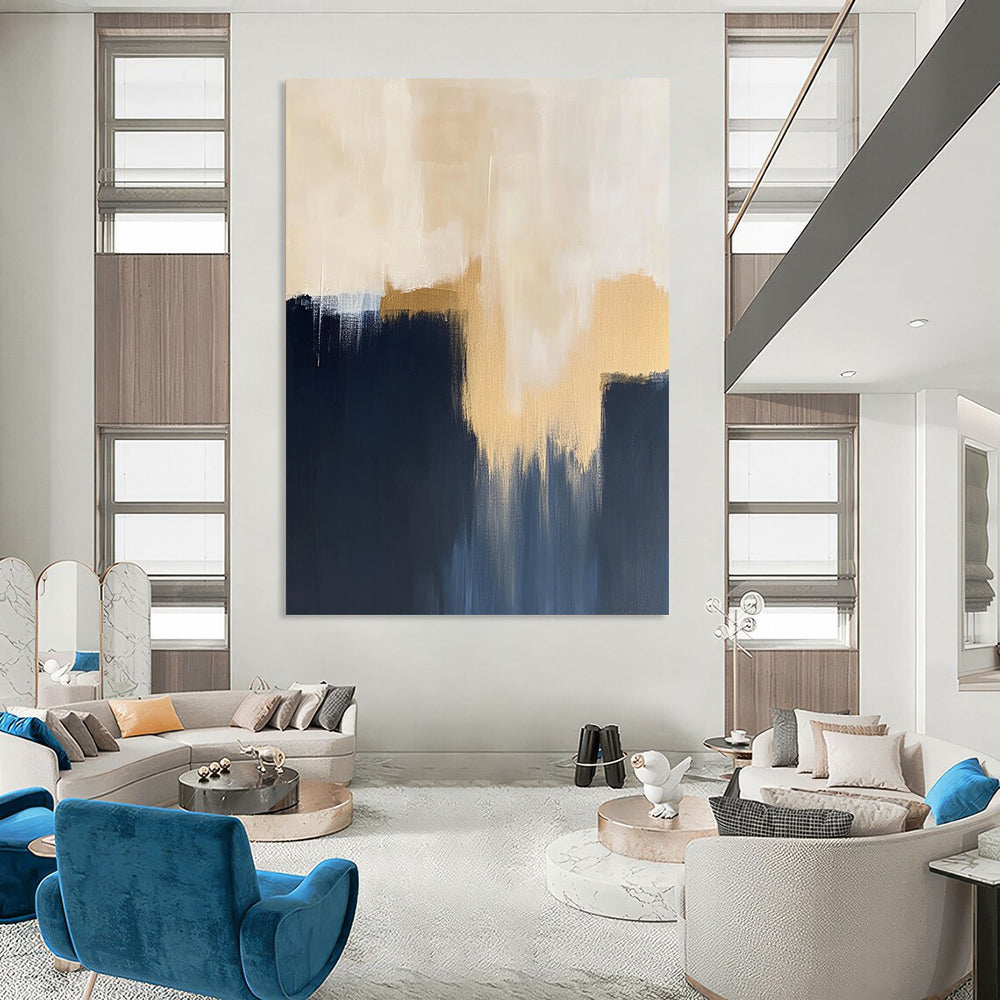 Contemporary hand-painted abstract artwork showcases minimalistic dark blue navy and beige hues with striking gold accents. DLZ0884