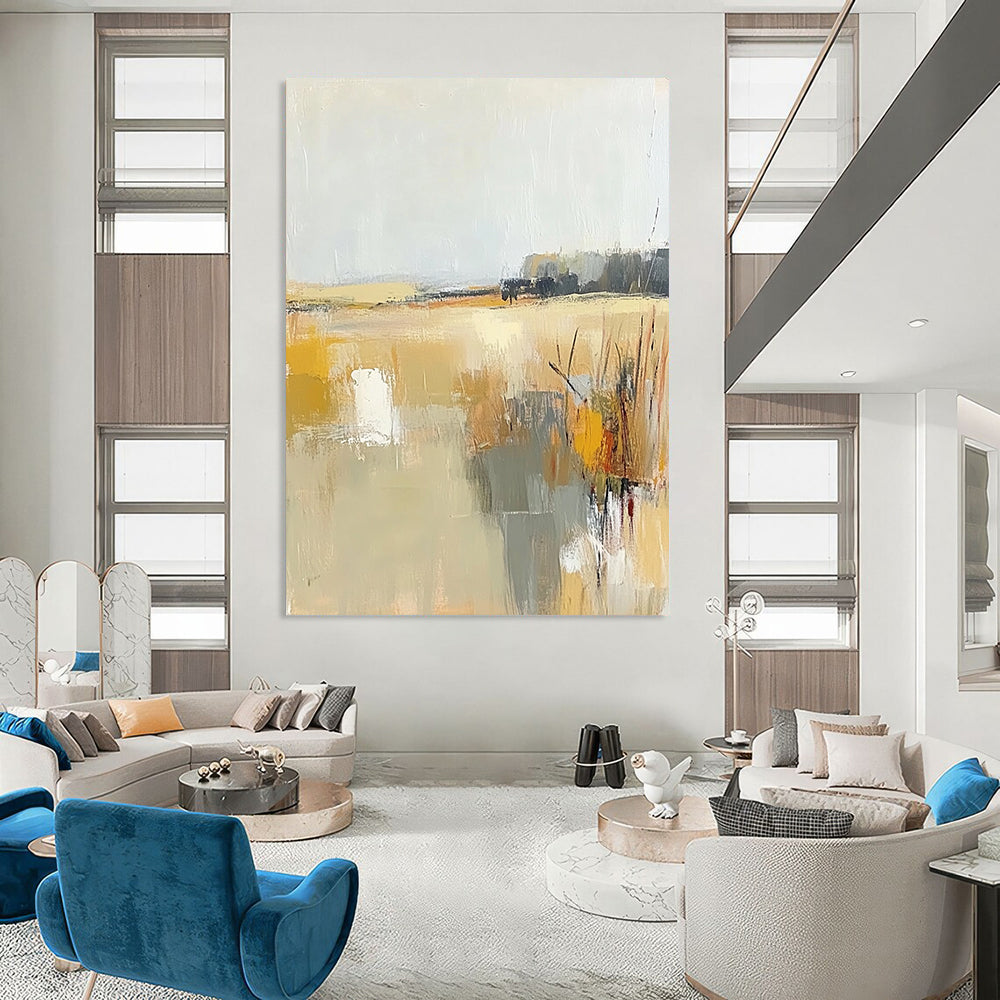 Contemporary abstract painting showcasing soft beige and gray tones with touches of yellow, illustrating the tranquil essence of a field beneath a light sky. DLZ0416