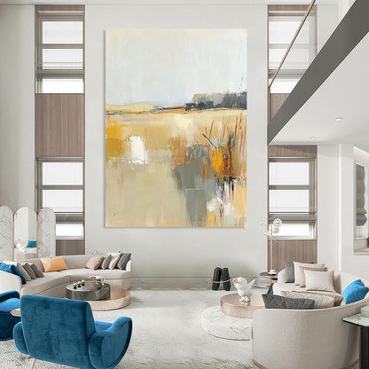 Contemporary abstract painting showcasing soft beige and gray tones with touches of yellow, illustrating the tranquil essence of a field beneath a light sky. DLZ0416