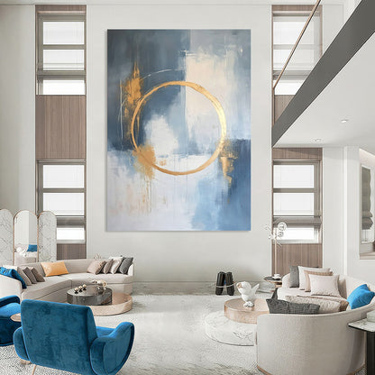 Large contemporary abstract painting features a light blue and white background with gold accents and elegant lines for a high-end aesthetic. DLZ0545