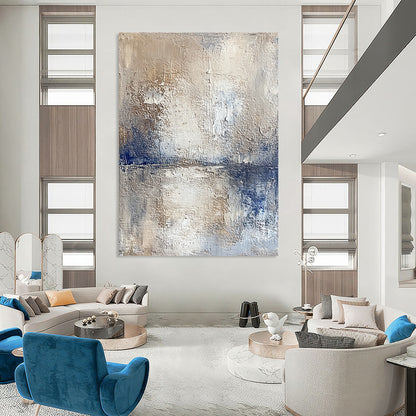 Contemporary hand-painted abstract artwork depicting a serene lake and sky with textured beige tones and vibrant blue accents for a striking visual experience. DLZ0471