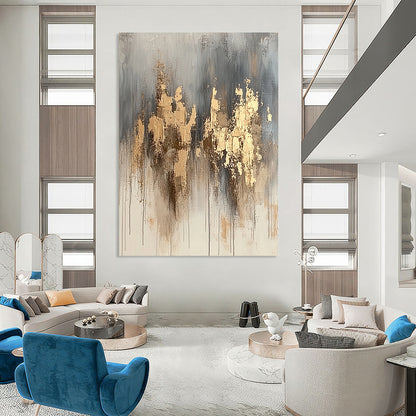 Contemporary hand-painted abstract artwork features neutral tones with gold accents and dynamic paint splashes for a refined aesthetic. DLZ1076