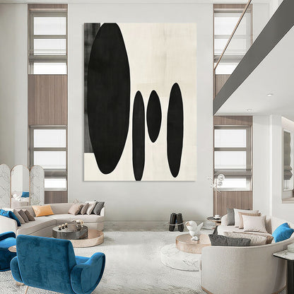 Contemporary minimalist artwork featuring organic black shapes balancing large forms on the left with delicate smaller shapes on the right. DLZ1547