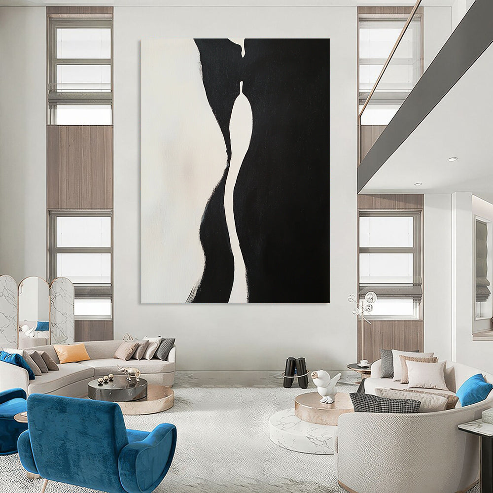 Contemporary hand-painted abstract artwork features two embracing figures with dynamic shapes and compelling negative space in a striking black and white composition. DLZ1543