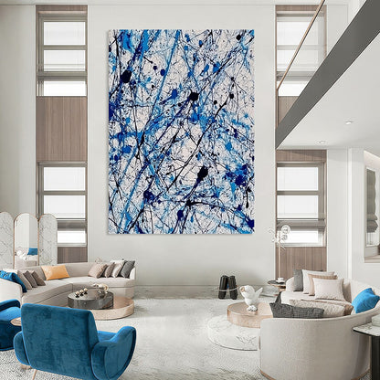 Contemporary abstract painting features vibrant blue and white ink splashes with lace-like patterns creating dynamic movement and evoking joy. DLZ1410