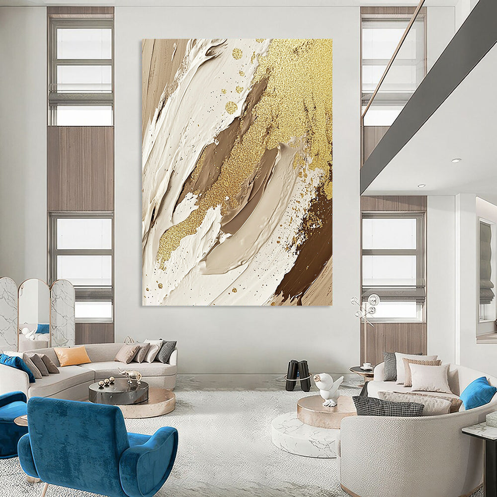 Large contemporary hand-painted abstract artwork featuring textures of cream, beige, and white with gold foil accents and glitter for an elegant touch. DLZ1188