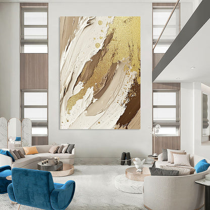 Large contemporary hand-painted abstract artwork featuring textures of cream, beige, and white with gold foil accents and glitter for an elegant touch. DLZ1188