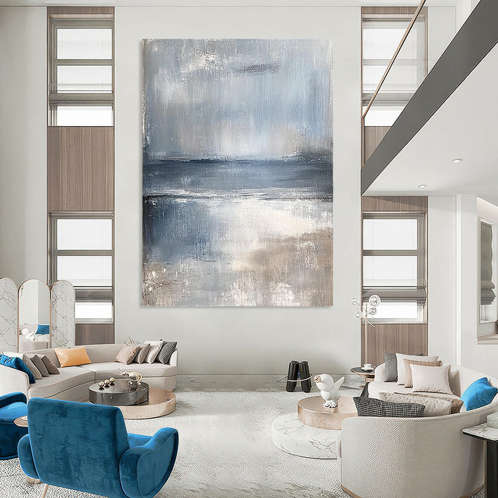 Large contemporary hand-painted abstract artwork featuring serene coastal landscape in muted tones of pale blue and gray evoking a calming sea breeze. DLZ0373