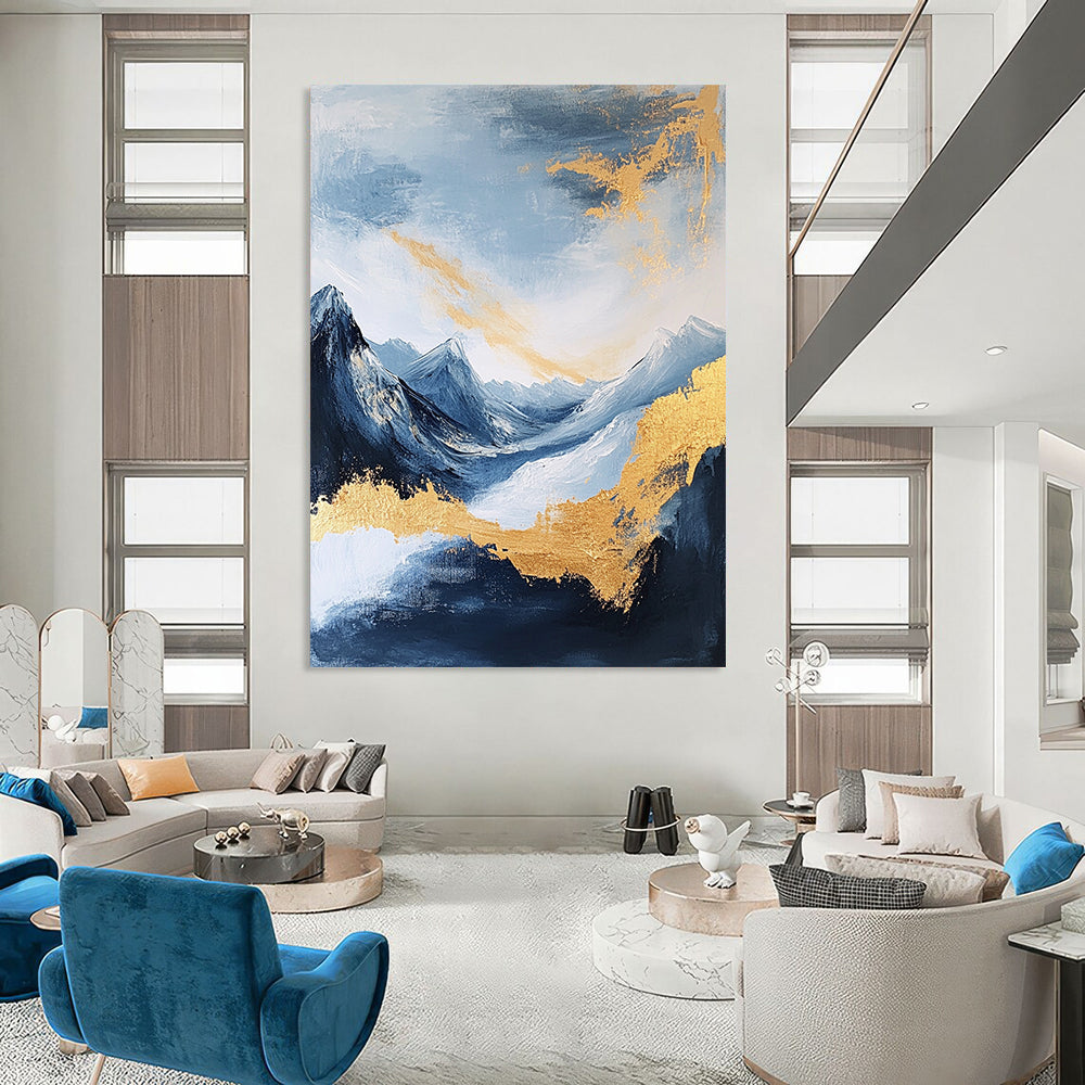 Large contemporary abstract painting featuring exquisite details of mountains clouds and sea in deep gold indigo and yellow colors against a white background DLZ0338