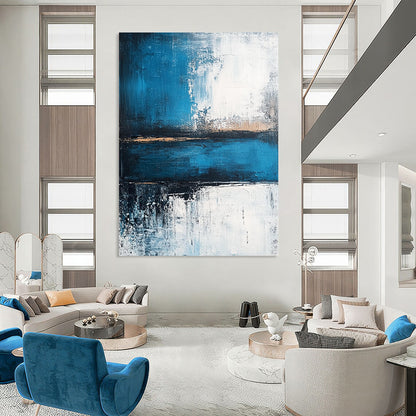 Contemporary abstract painting showcasing a serene blue sea with deep gray strokes and light white accents, evoking tranquility and strength. DLZ0360