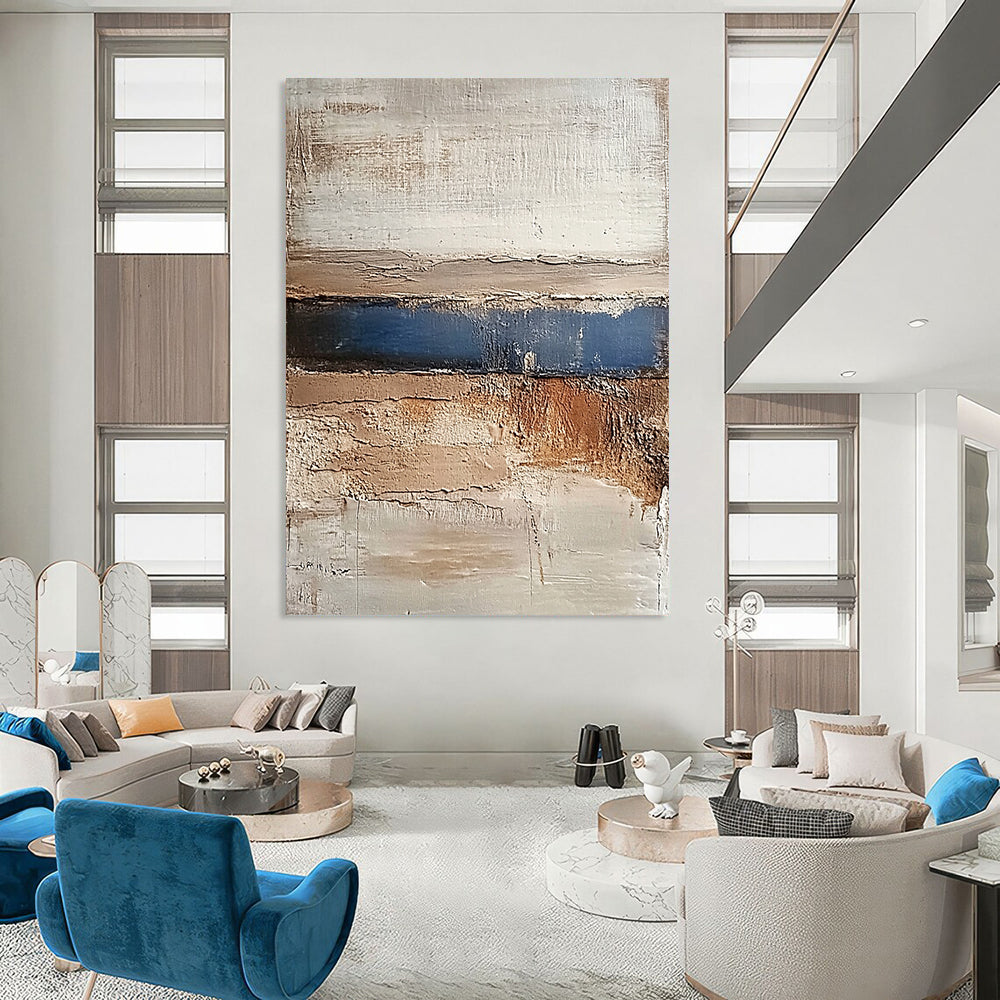 Contemporary abstract painting featuring earthy tones of beige brown grey and blue conveying calmness with a textured landscape of hills and water. DLZ1479
