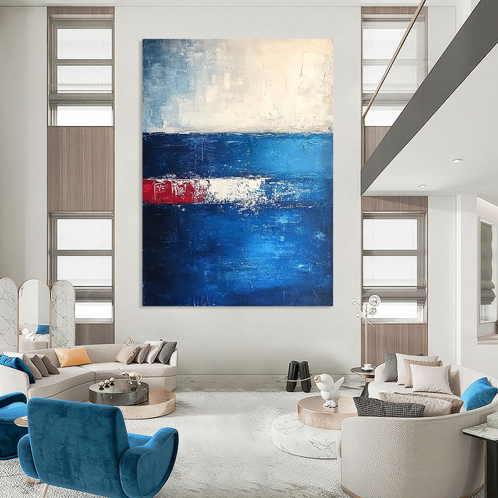 Modern abstract artwork featuring deep blues and dark grays with thick textured brushstrokes creating an atmospheric horizon in a serene minimalist composition. DLZ0365