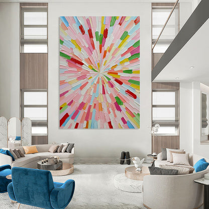 Large contemporary abstract artwork featuring vibrant colors in a sunburst pattern crafted from small paper sticks on a white background. DLZ1275