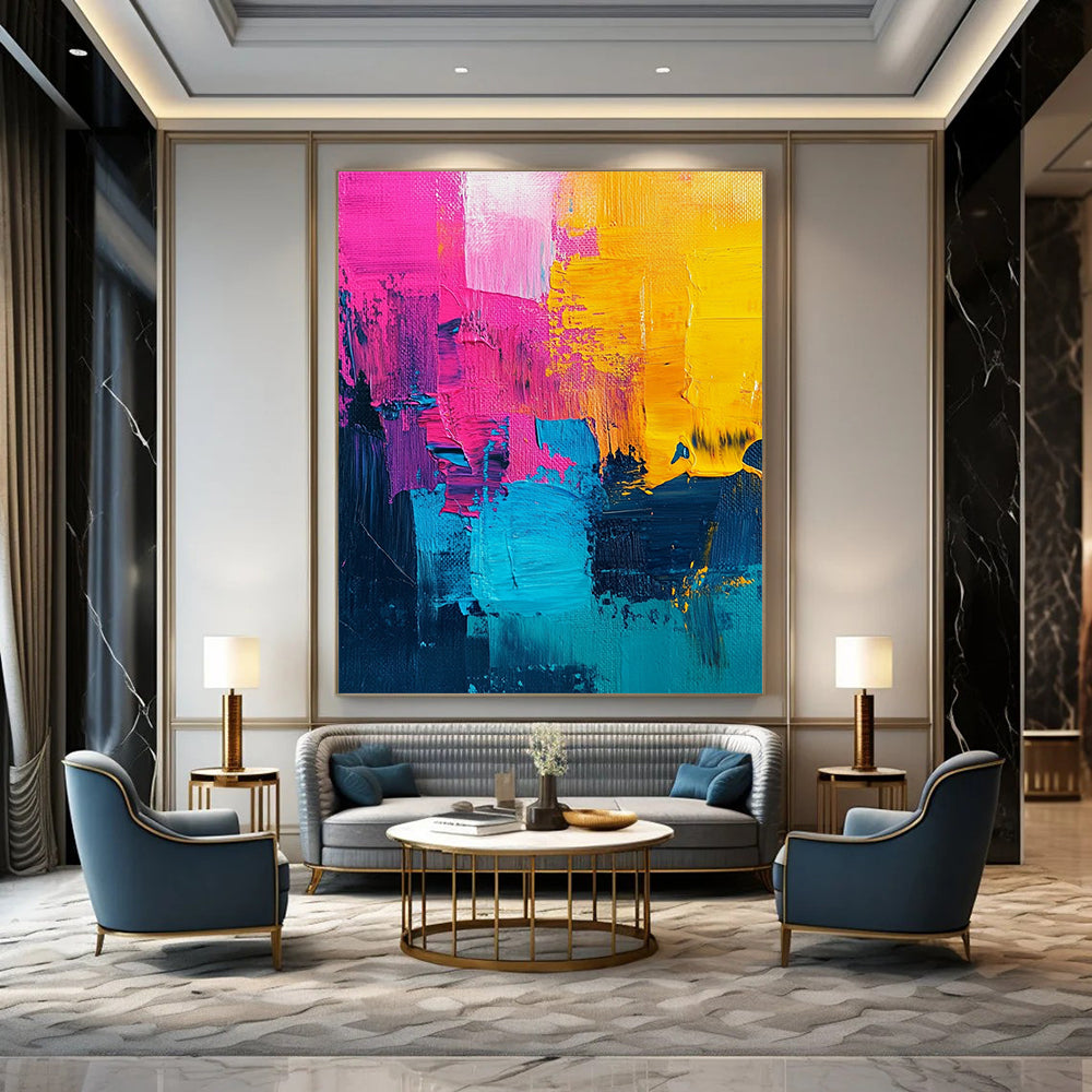 Vibrant contemporary abstract painting with bold pink and yellow accents, a striking turquoise center, and rich dark blue features, showcasing textured acrylic brush strokes. DLZ0776