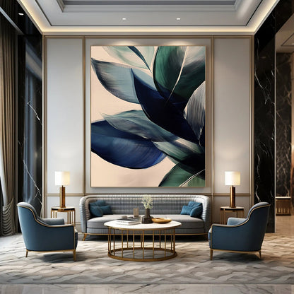 Large contemporary abstract painting featuring vibrant leaves in dark blue and green tones on a beige background with soft edges and layered forms. DLZ0625