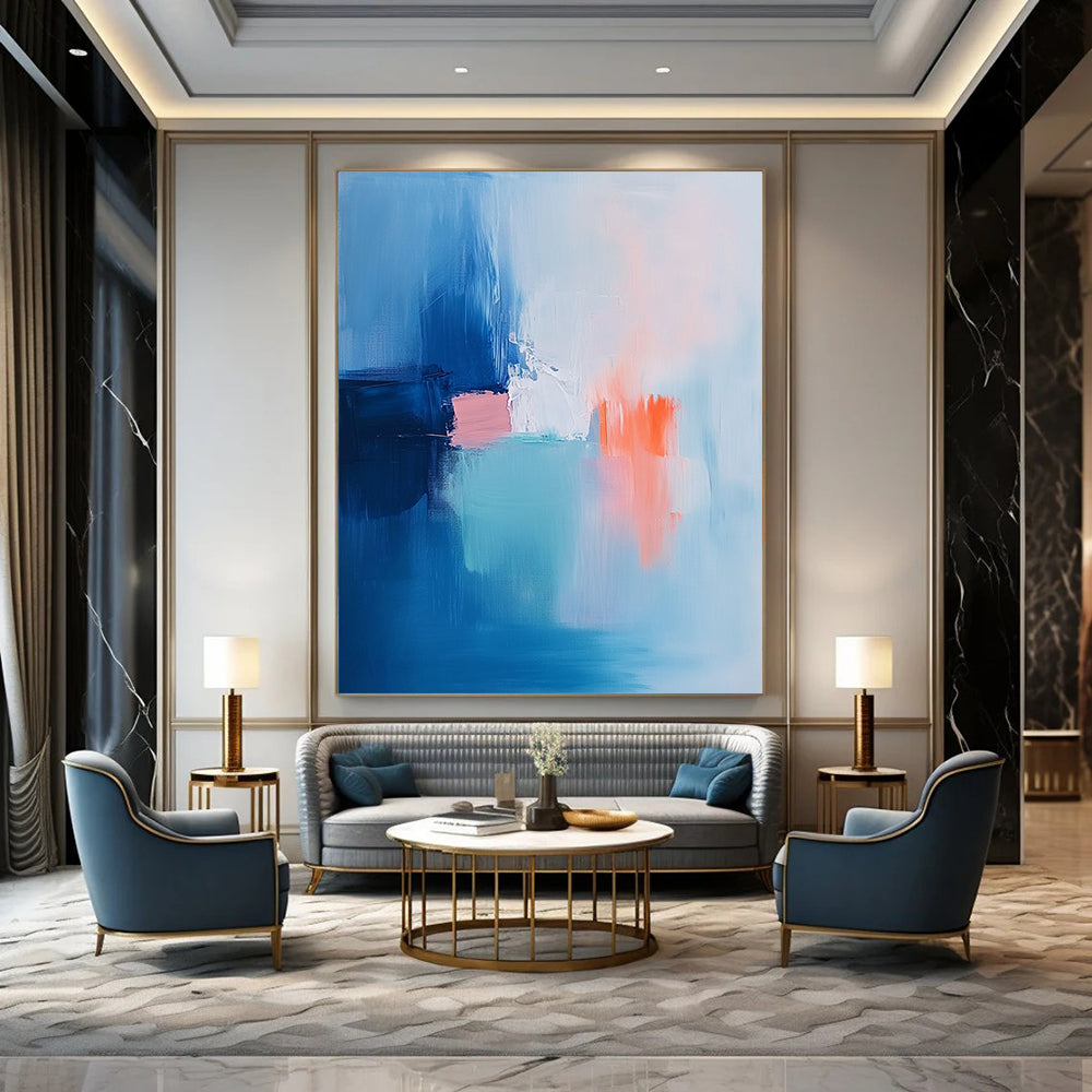 Contemporary hand-painted abstract art featuring soft brush strokes in light blue pink and white with navy blue and orange accents. DLZ1053