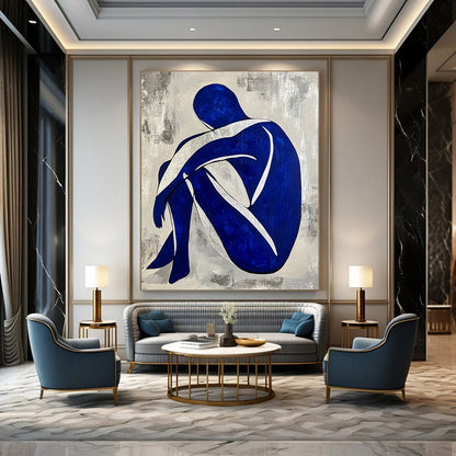 Contemporary hand-painted abstract artwork featuring a seated blue and white figure with a grey background and silver lines. DLZ0586