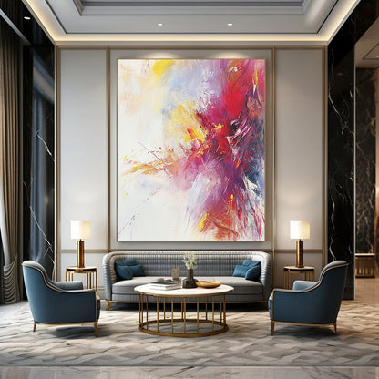 Large contemporary hand-painted abstract artwork featuring warm colors and soft brushstrokes on a serene white background with subtle splashes of bright color. DLZ1068