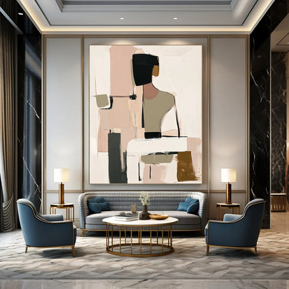 Contemporary handmade abstract art featuring muted beige black and white tones with soft pink and green hints and loose shapes around a visible table. DLZ0912