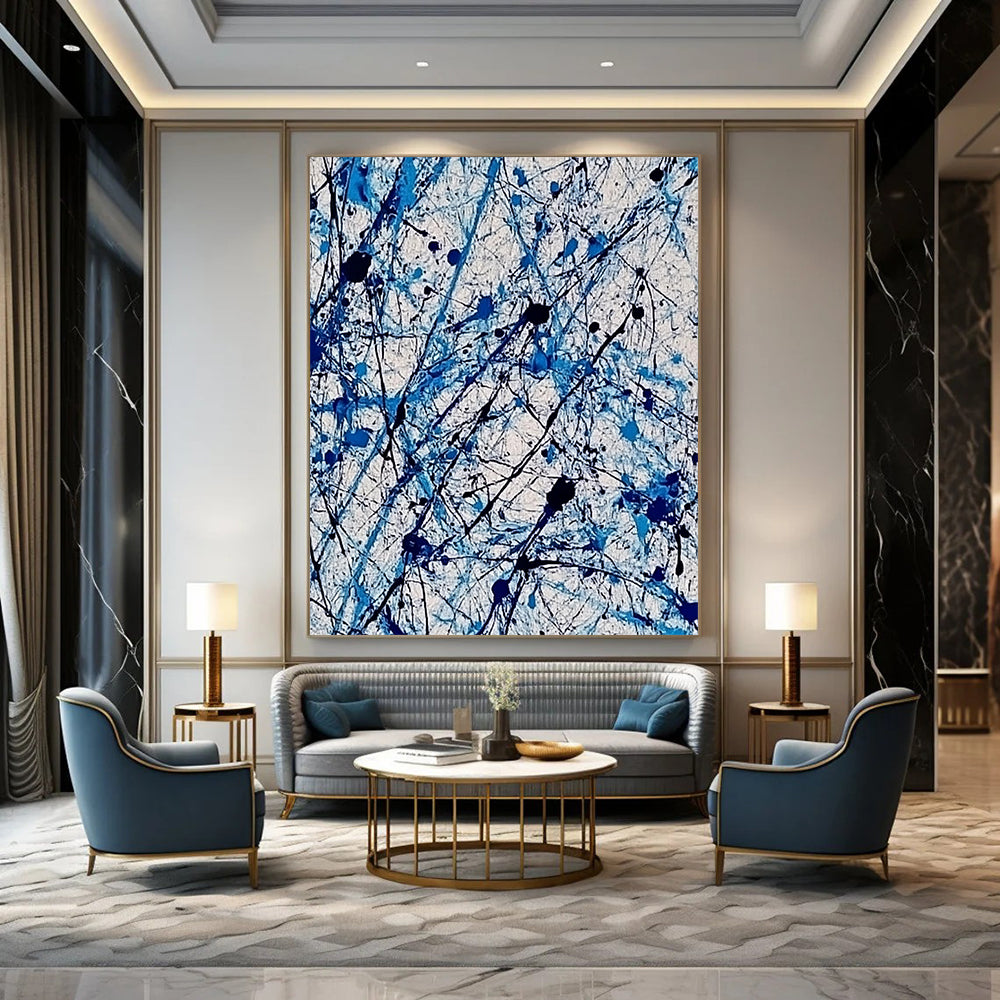 Contemporary abstract painting features vibrant blue and white ink splashes with lace-like patterns creating dynamic movement and evoking joy. DLZ1410