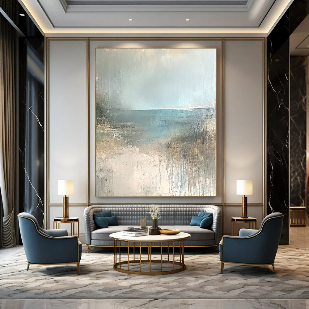 Contemporary hand-painted abstract art featuring a serene empty beach in soft beige, pale blue, and grey tones. Perfect for calming spaces. DLZ0950