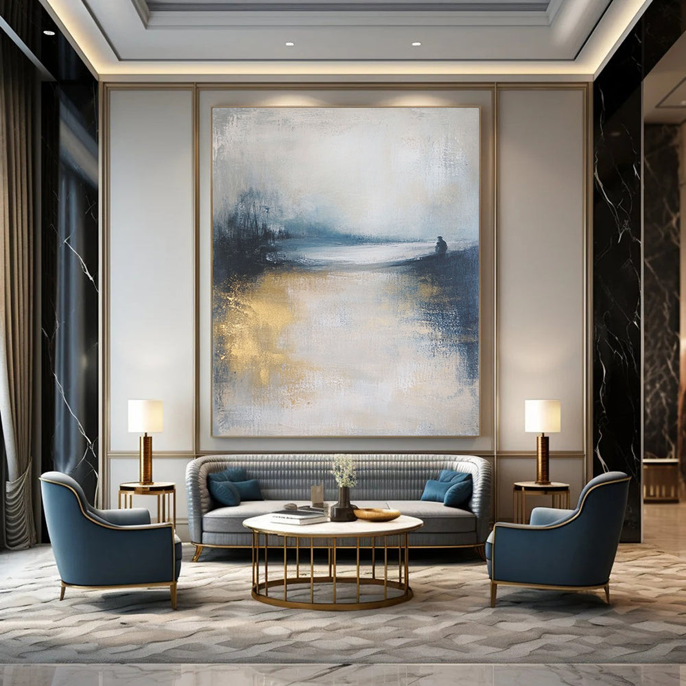 Contemporary abstract art featuring a moody ocean landscape in soft focus, neutral tones enhanced by gold and blue, creating a serene atmosphere. DLZ0464