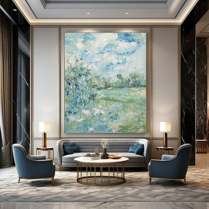 Contemporary hand-painted abstract art featuring soft clouds over serene trees and grass with a calming color palette of blue green and beige. DLZ1473