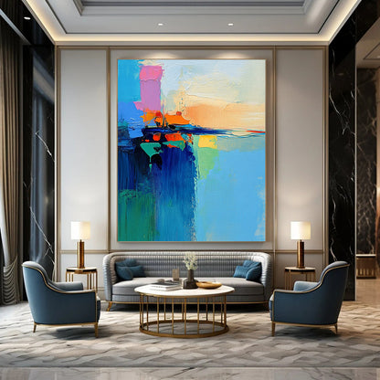 Contemporary abstract art featuring a vibrant lake and sky painted with a palette knife in dynamic brush strokes of blue green orange pink and yellow. DLZ0469