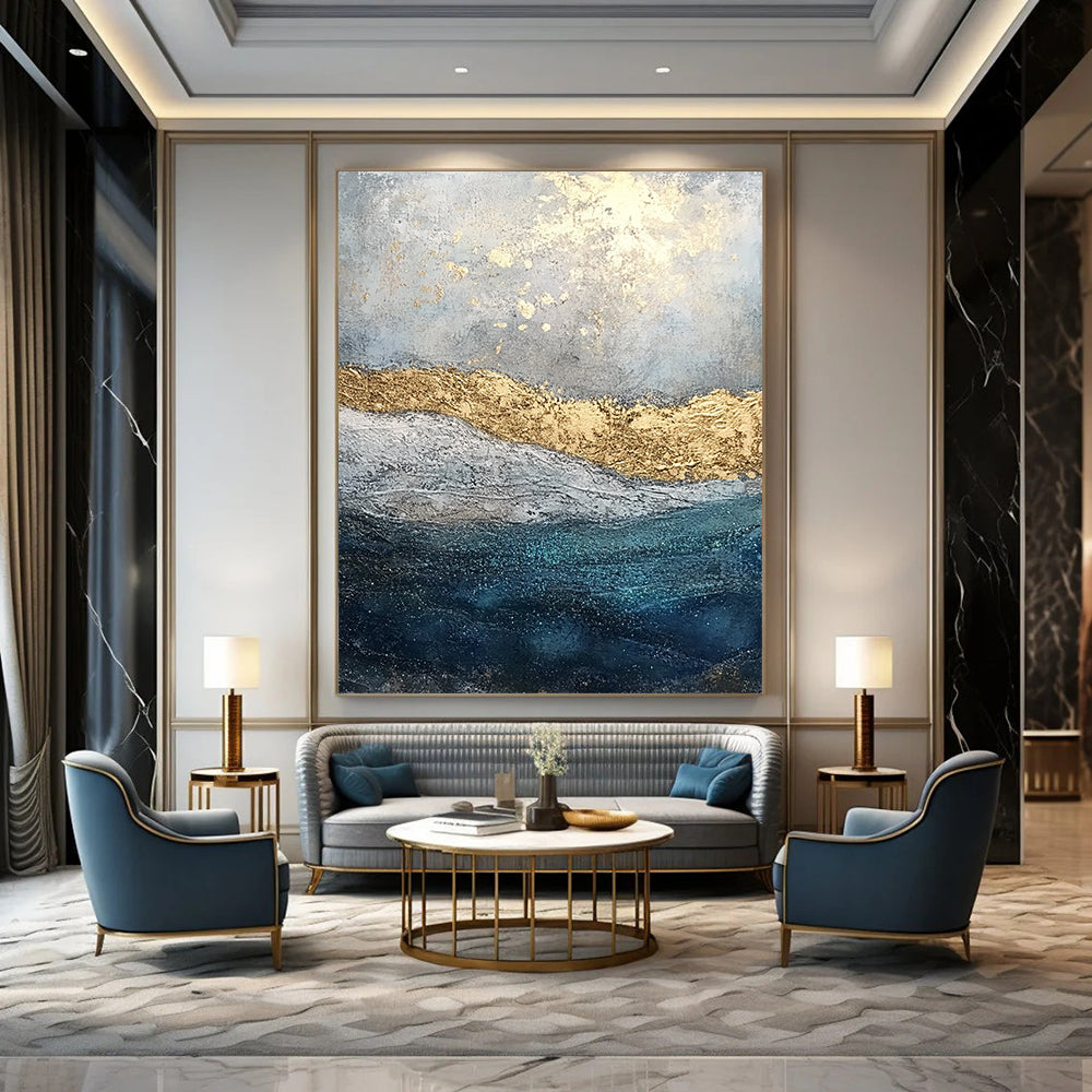Contemporary abstract painting features textured layers of paint and glitter with a soft gray sky and deep blue sea enhanced by golden foil accents. DLZ1078
