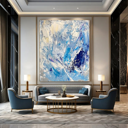 Contemporary large abstract artwork featuring thick impasto strokes in light blue, white, and silver, evoking the essence of ice and snow. DLZ0624