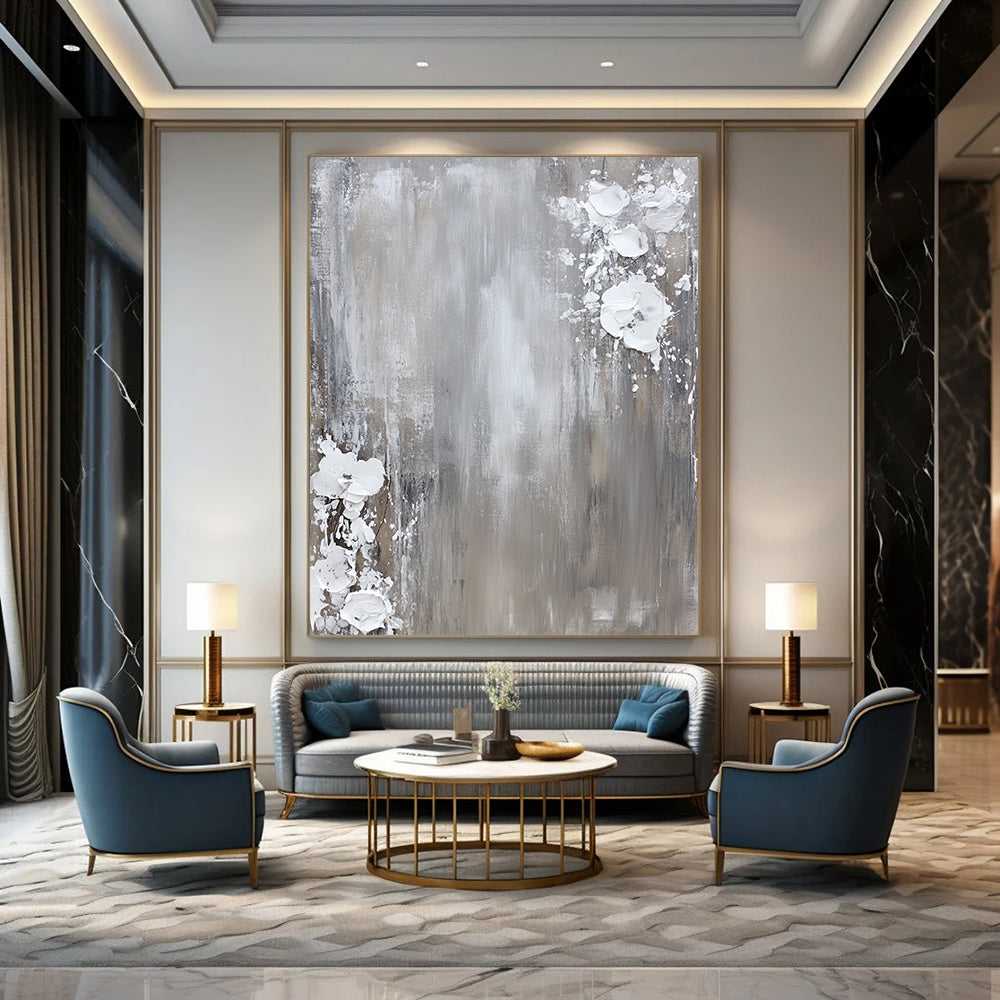 Contemporary hand-painted abstract art featuring a neutral gray and white palette with dynamic paint splashes on canvas for a minimalist aesthetic. DLZ0715