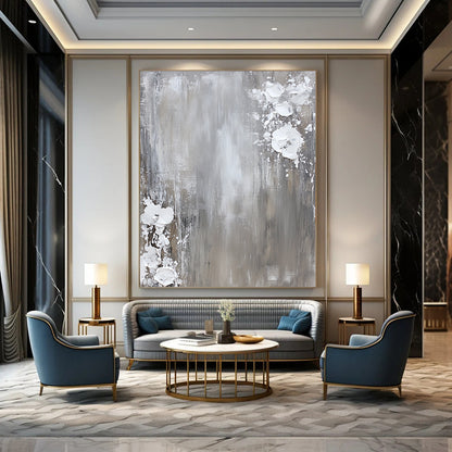 Contemporary hand-painted abstract art featuring a neutral gray and white palette with dynamic paint splashes on canvas for a minimalist aesthetic. DLZ0715