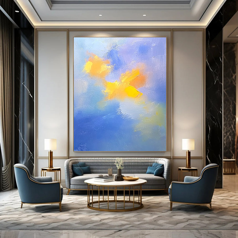 Contemporary abstract painting featuring soft blue and yellow clouds with gentle oil strokes on canvas, inspired by the style of Cuno Amiet. DLZ0354