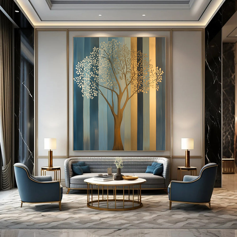 Contemporary hand-painted abstract artwork features an elegant tree in soft gold and silver tones against muted teal and geometric blue-gray stripes. DLZ1403