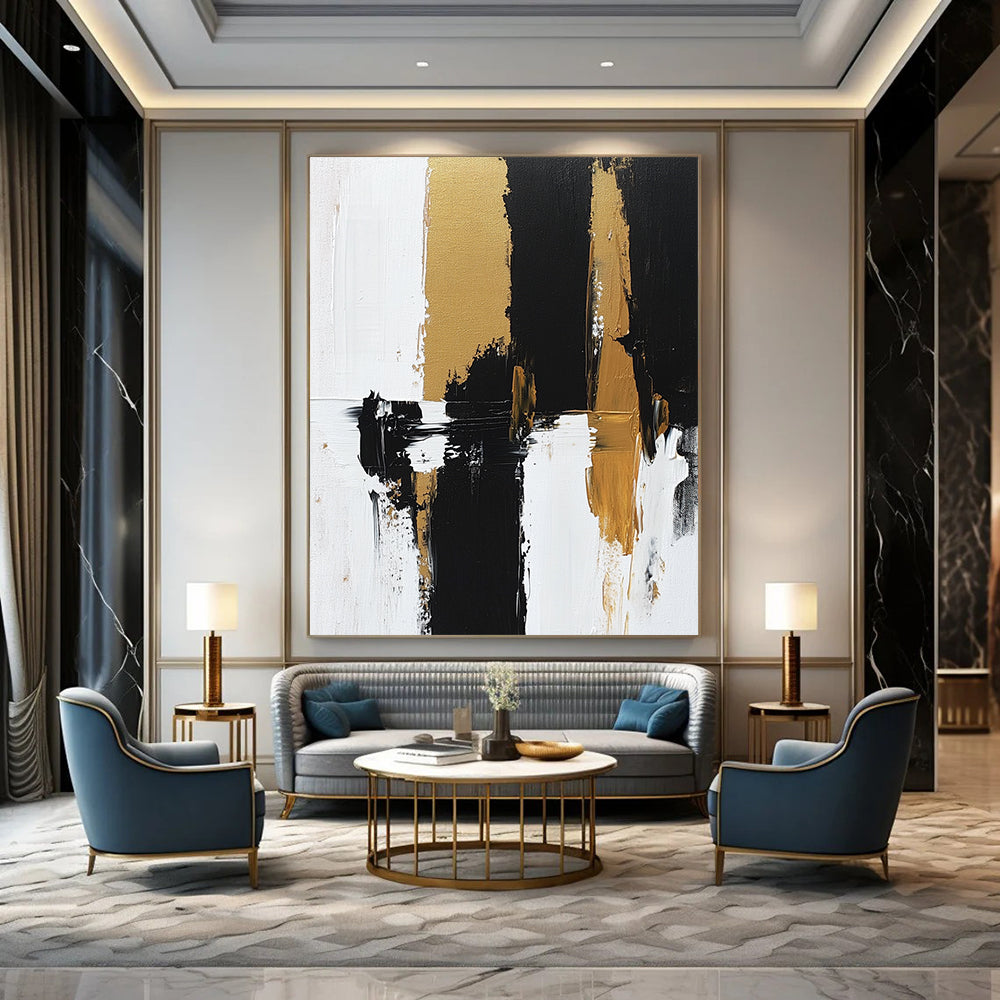 Contemporary hand-painted abstract artwork features bold brush strokes and rich textures in black, white, and gold tones on canvas. DLZ0495