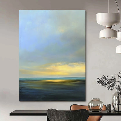 Contemporary abstract artwork featuring a serene sky with soft blues and grays, accented by light yellow highlights and distant clouds. DLZ0492