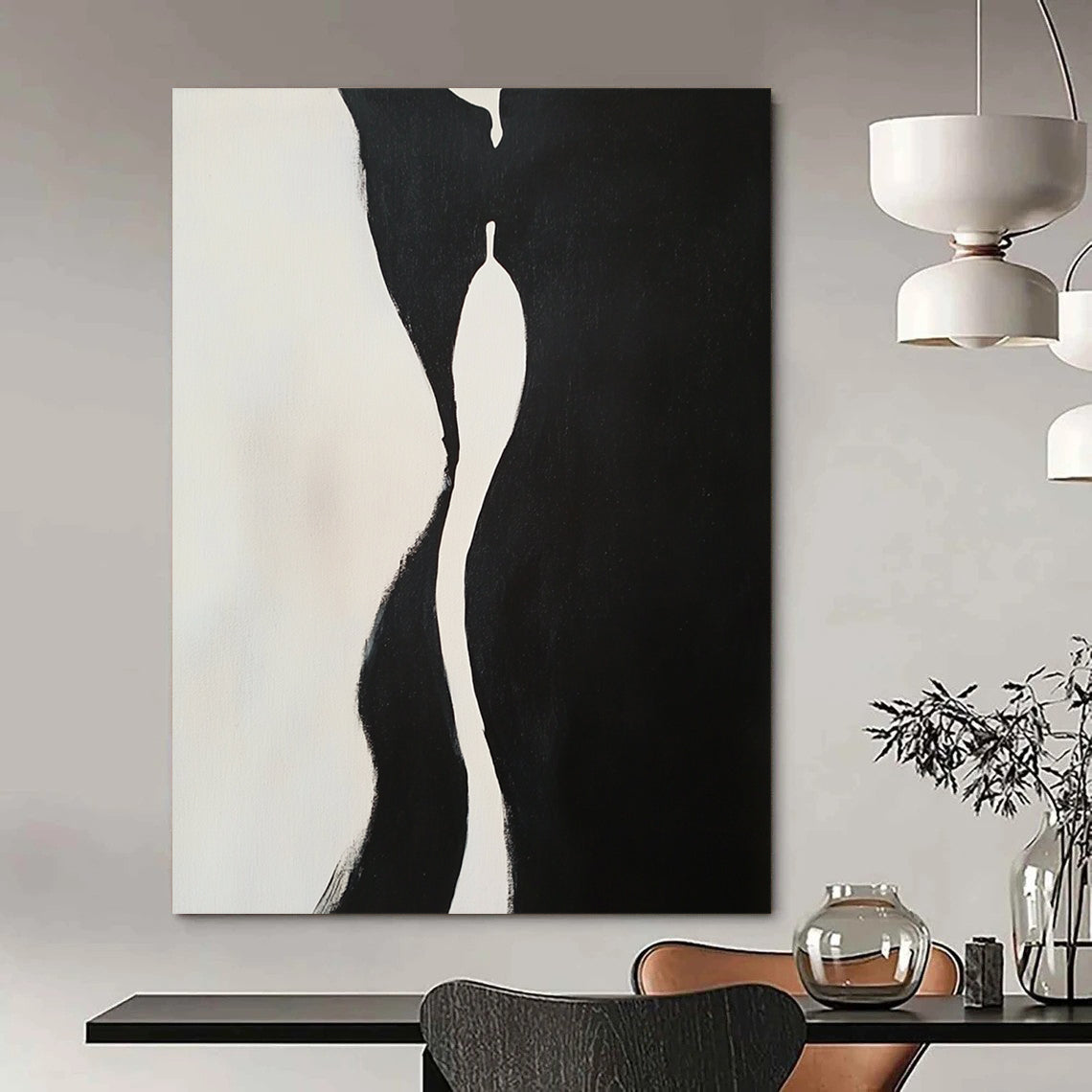 Contemporary hand-painted abstract artwork features two embracing figures with dynamic shapes and compelling negative space in a striking black and white composition. DLZ1543