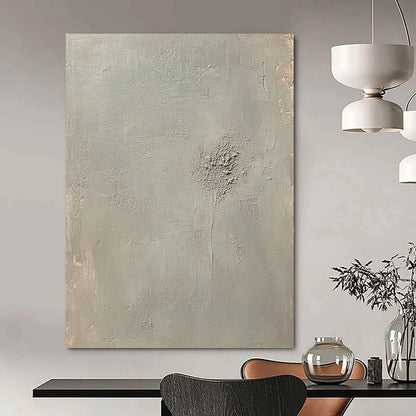 Contemporary abstract artwork featuring an empty light gray canvas with soft tones and faint embossed writing at the center. DLZ0576