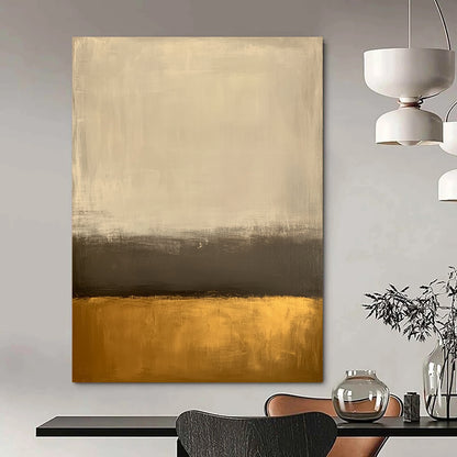 Large contemporary abstract painting featuring an off-white background and gold bottom with minimalist earth tones and low contrast for a serene aesthetic. DLZ1013