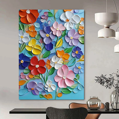 Vibrant contemporary hand-painted abstract artwork featuring blooming flowers in bold colors with textured strokes on a light blue canvas. DLZ1493