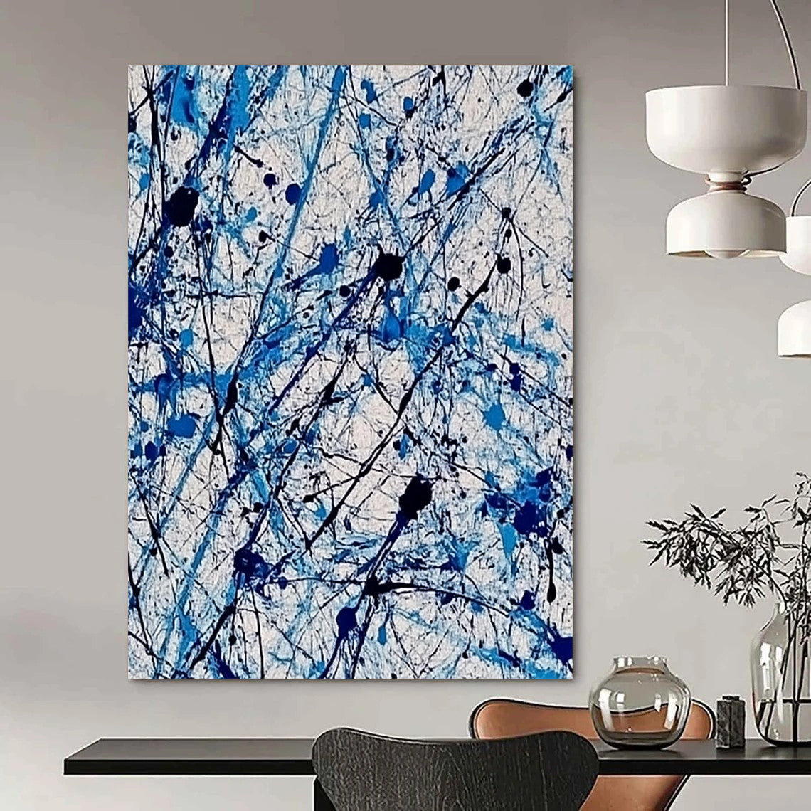 Contemporary abstract painting features vibrant blue and white ink splashes with lace-like patterns creating dynamic movement and evoking joy. DLZ1410