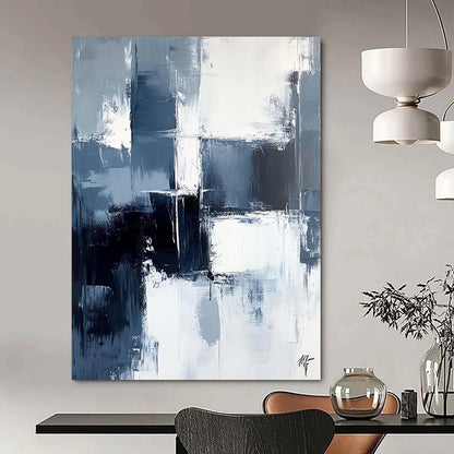 Large contemporary abstract painting featuring dark blue and white brushstrokes on a light gray background evoking calmness and simplicity. DLZ0351