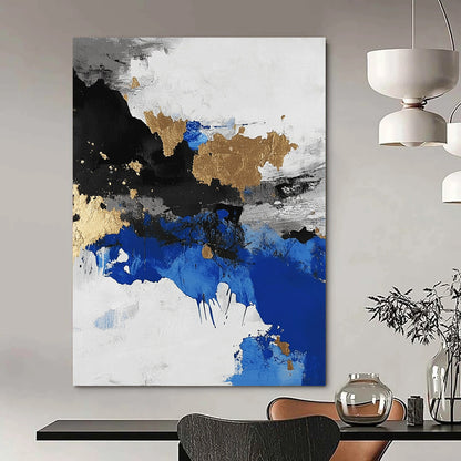 Contemporary abstract artwork showcasing an aerial view of an arctic landscape in black and white with blue accents and gold leaf highlights. DLZ0572