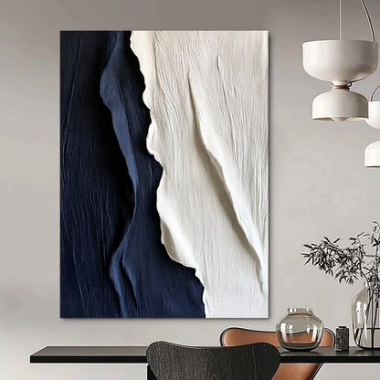Contemporary hand-painted abstract artwork features textured white and navy blue silk, elegantly draping to create a striking visual impact on any wall. DLZ1250