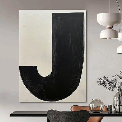 Contemporary hand-painted abstract art featuring bold black and white contrasts with a prominent beige J and a dark grey organic form. DLZ1342