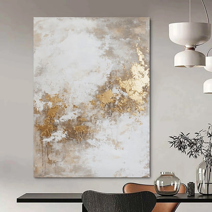 Contemporary hand-painted abstract artwork featuring dynamic paint splatters and luxurious gold foil accents against a backdrop of beige and grey hues. DLZ0534
