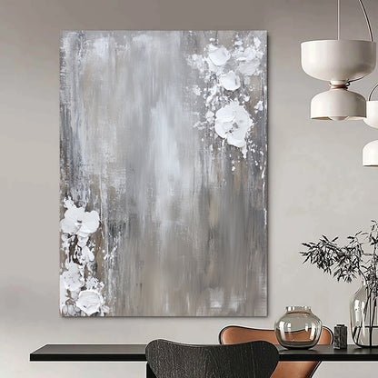 Contemporary hand-painted abstract art featuring a neutral gray and white palette with dynamic paint splashes on canvas for a minimalist aesthetic. DLZ0715