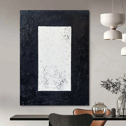 Contemporary hand-painted abstract art featuring a white rectangle on a textured black background creating a striking minimalist monochrome effect. DLZ1520