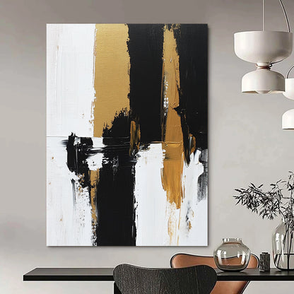 Contemporary hand-painted abstract artwork features bold brush strokes and rich textures in black, white, and gold tones on canvas. DLZ0495